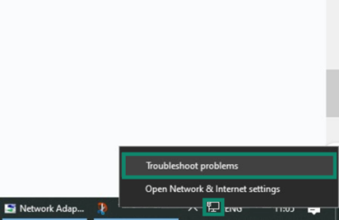 Windows taskbar with the network icon highlighted and the right-click menu for it open with Troubleshoot problems highlighted.