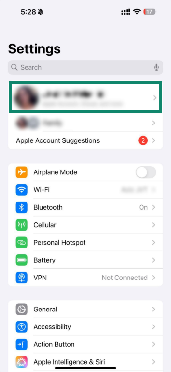 Screenshot showing Apple ID in the iPhone Settings menu